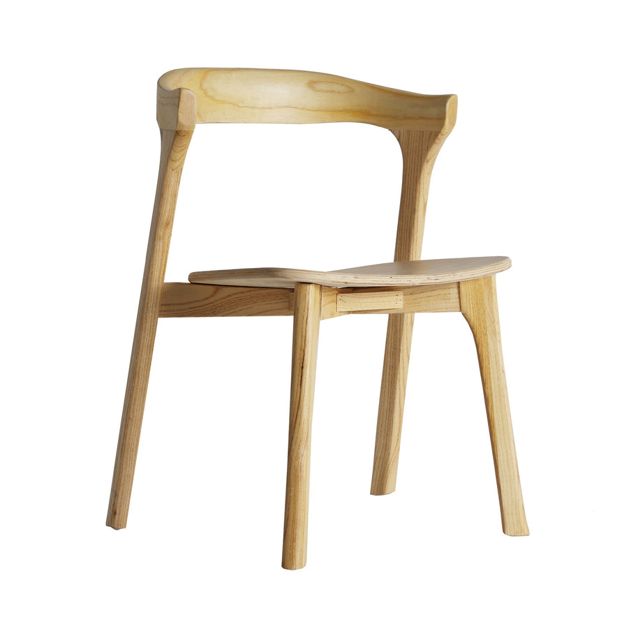 KUTA CHAIR in a modern interior setting
