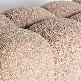 MARBURGO BED FOOT STOOL in a modern interior setting