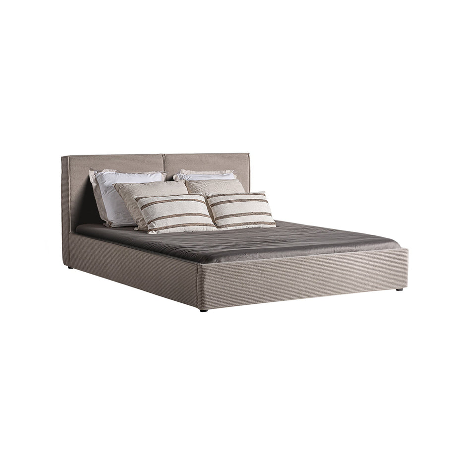 NATASHA BED in a modern interior setting