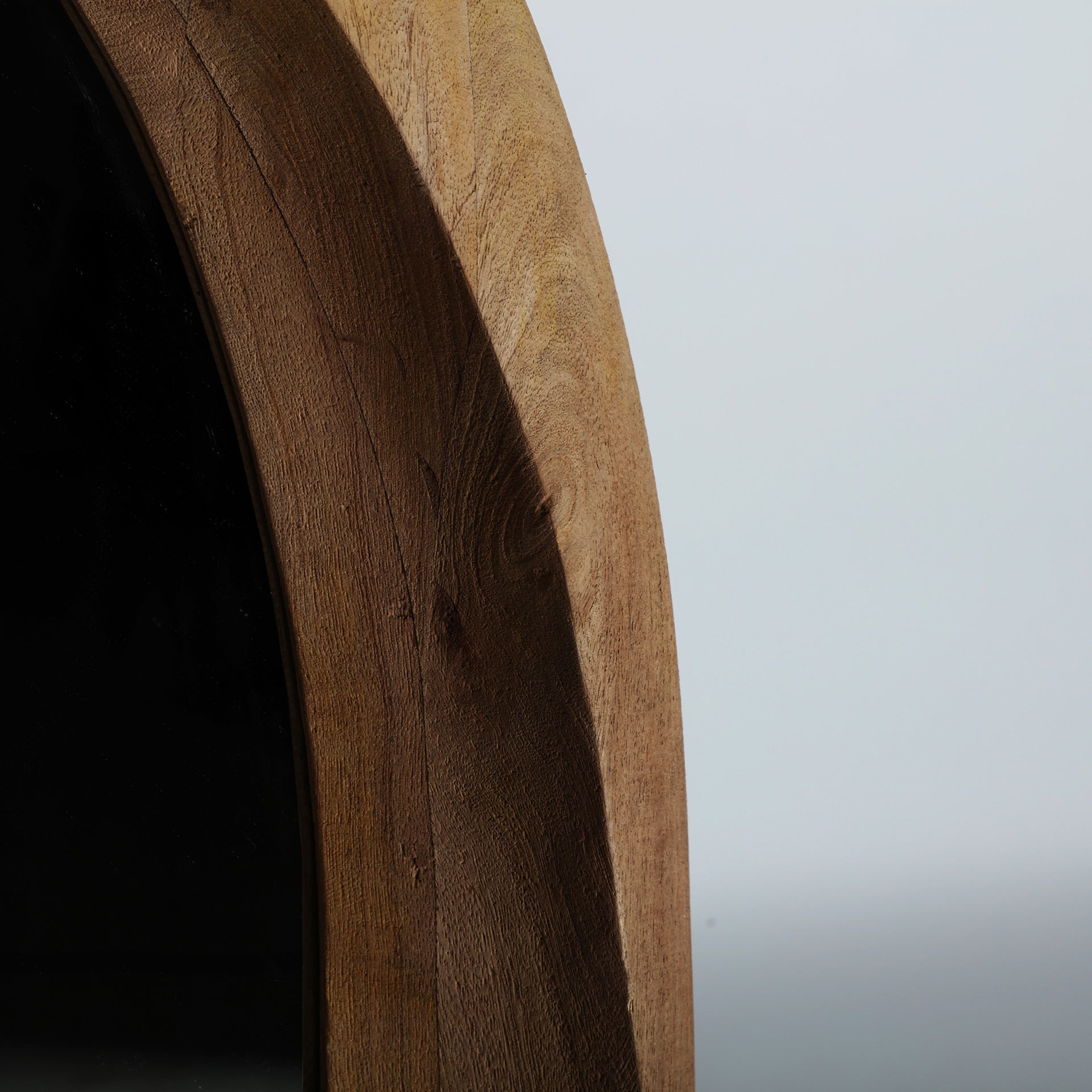 SJELD MIRROR in a modern interior setting