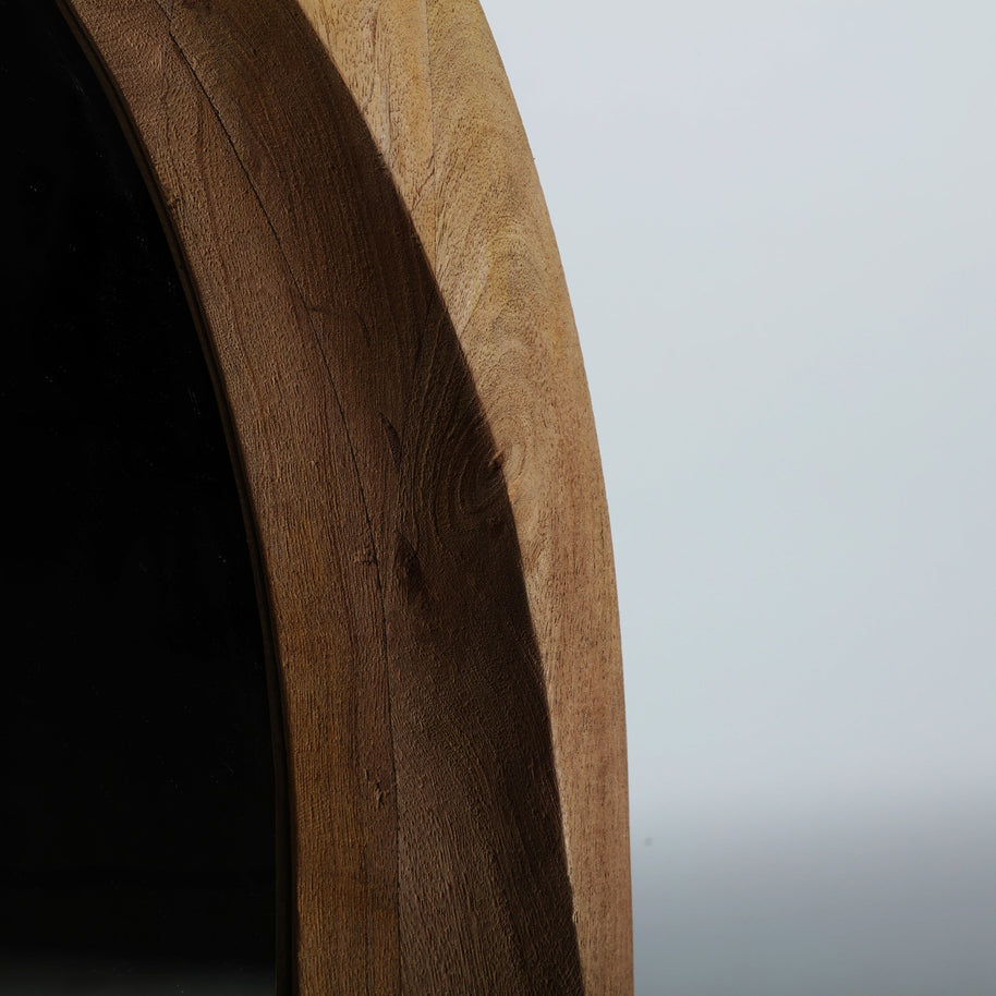 SJELD MIRROR in a modern interior setting