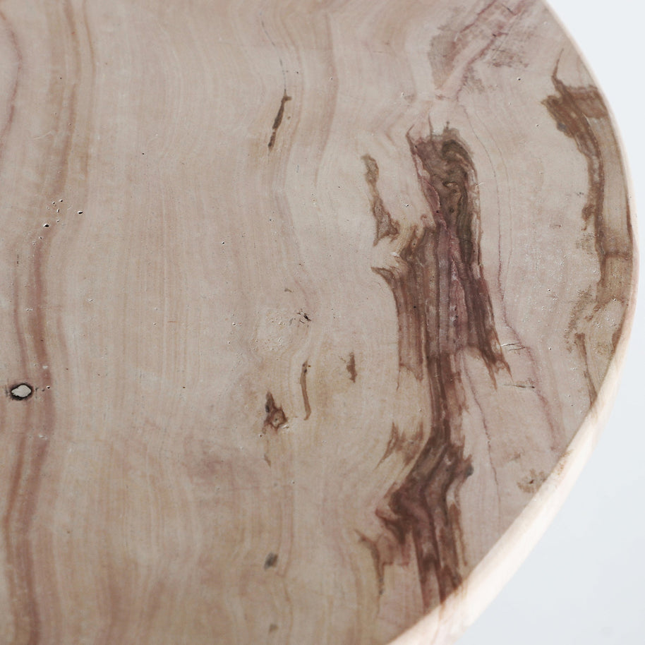 VRADS SIDE TABLE in a modern interior setting