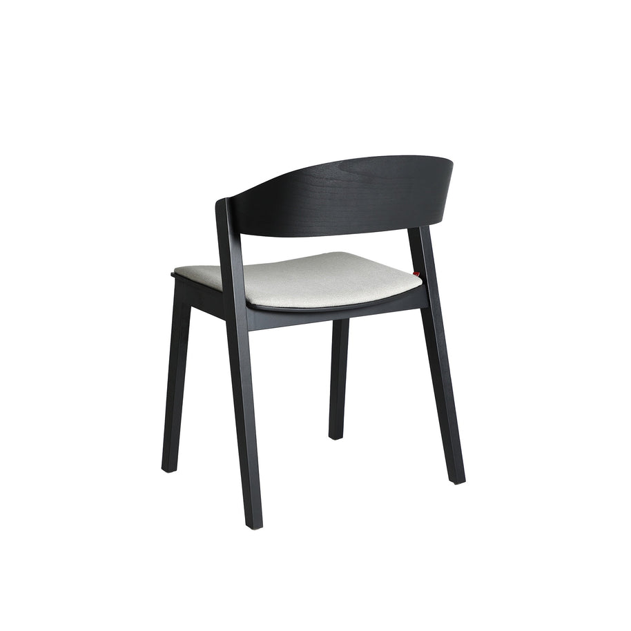 BORKEN CHAIR in a modern interior setting