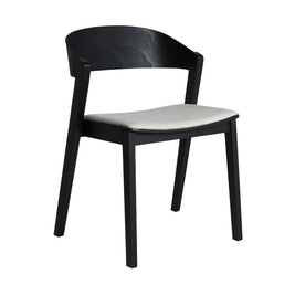 BORKEN CHAIR in a modern interior setting