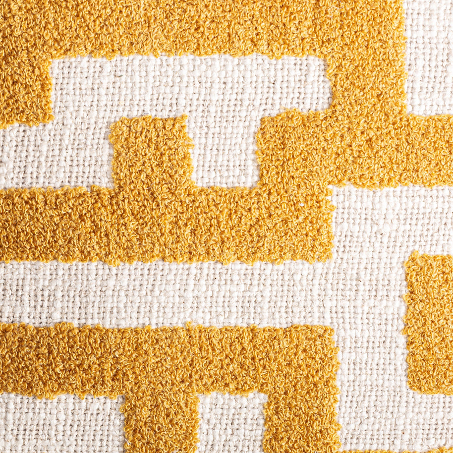 AMAIA CUSHION in a modern interior setting