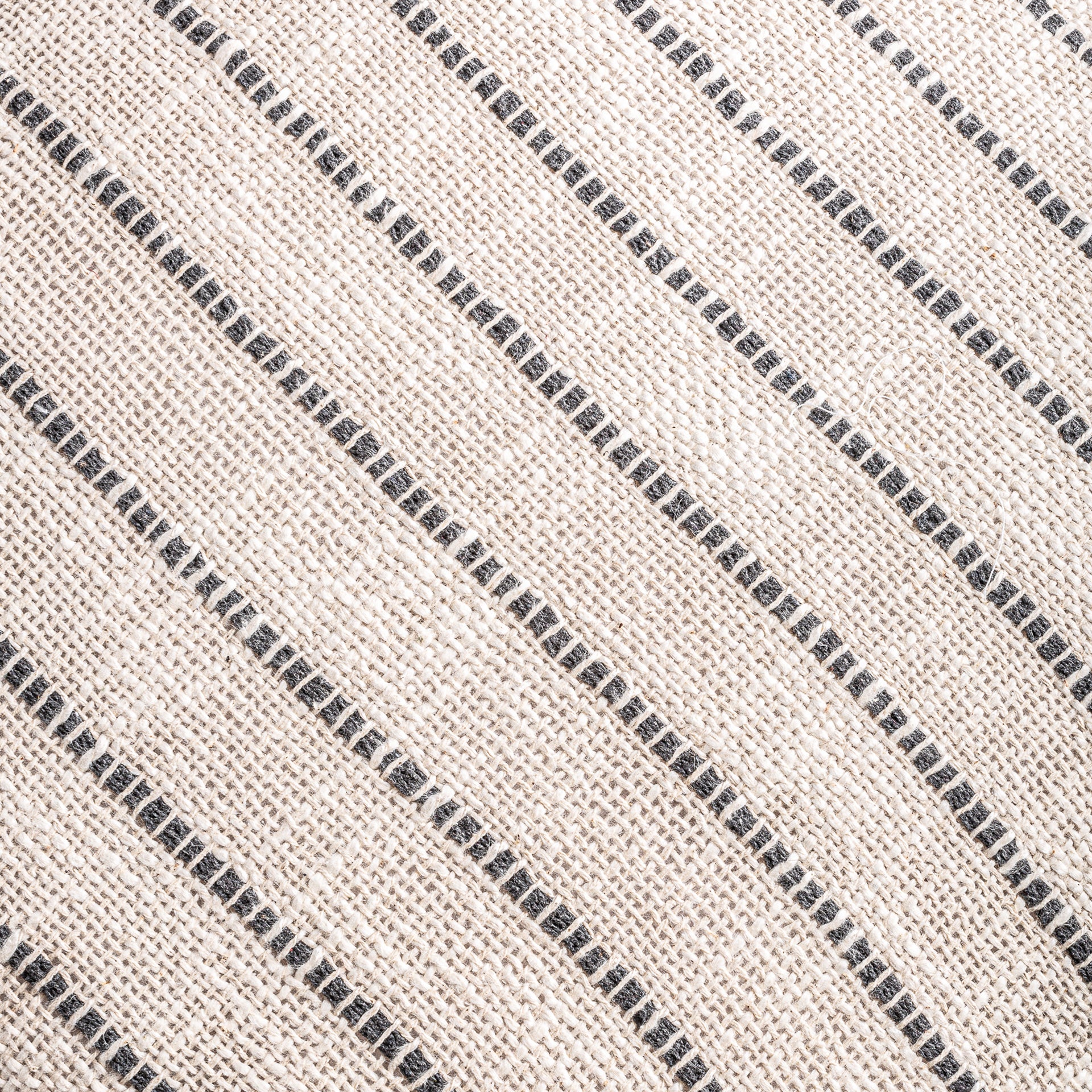 SALEHA CUSHION in a modern interior setting