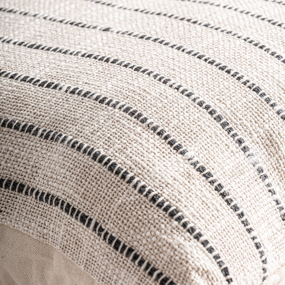 SALEHA CUSHION in a modern interior setting