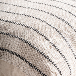 SALEHA CUSHION in a modern interior setting