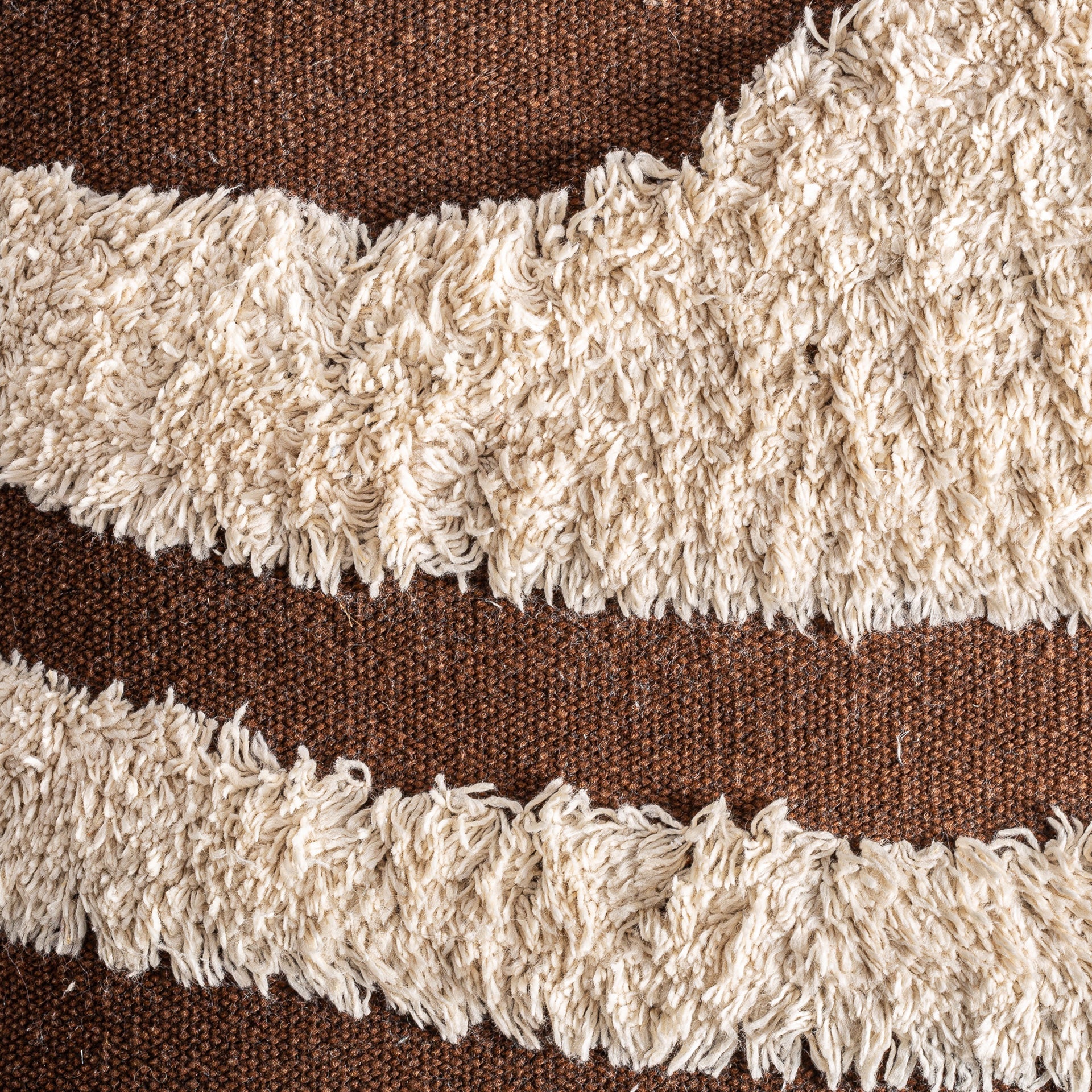 SAHUN CUSHION in a modern interior setting