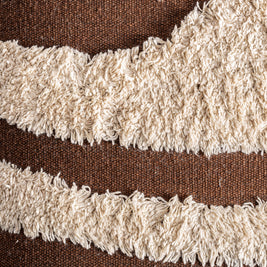 SAHUN CUSHION in a modern interior setting