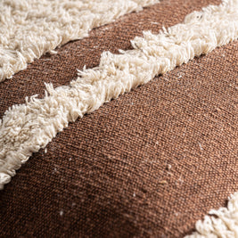 SAHUN CUSHION in a modern interior setting