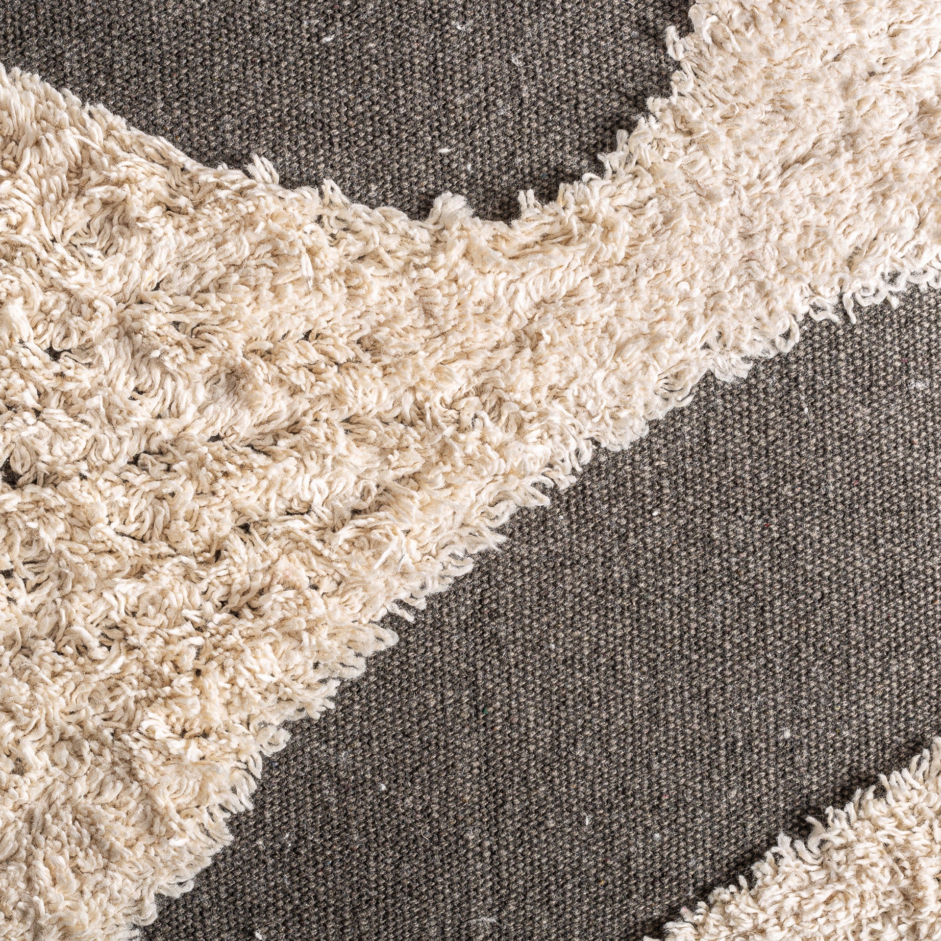 SAHUN CUSHION in a modern interior setting