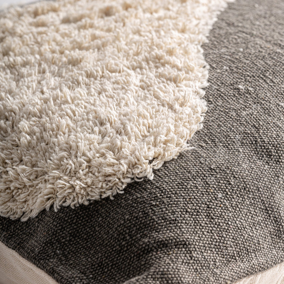 SAHUN CUSHION in a modern interior setting