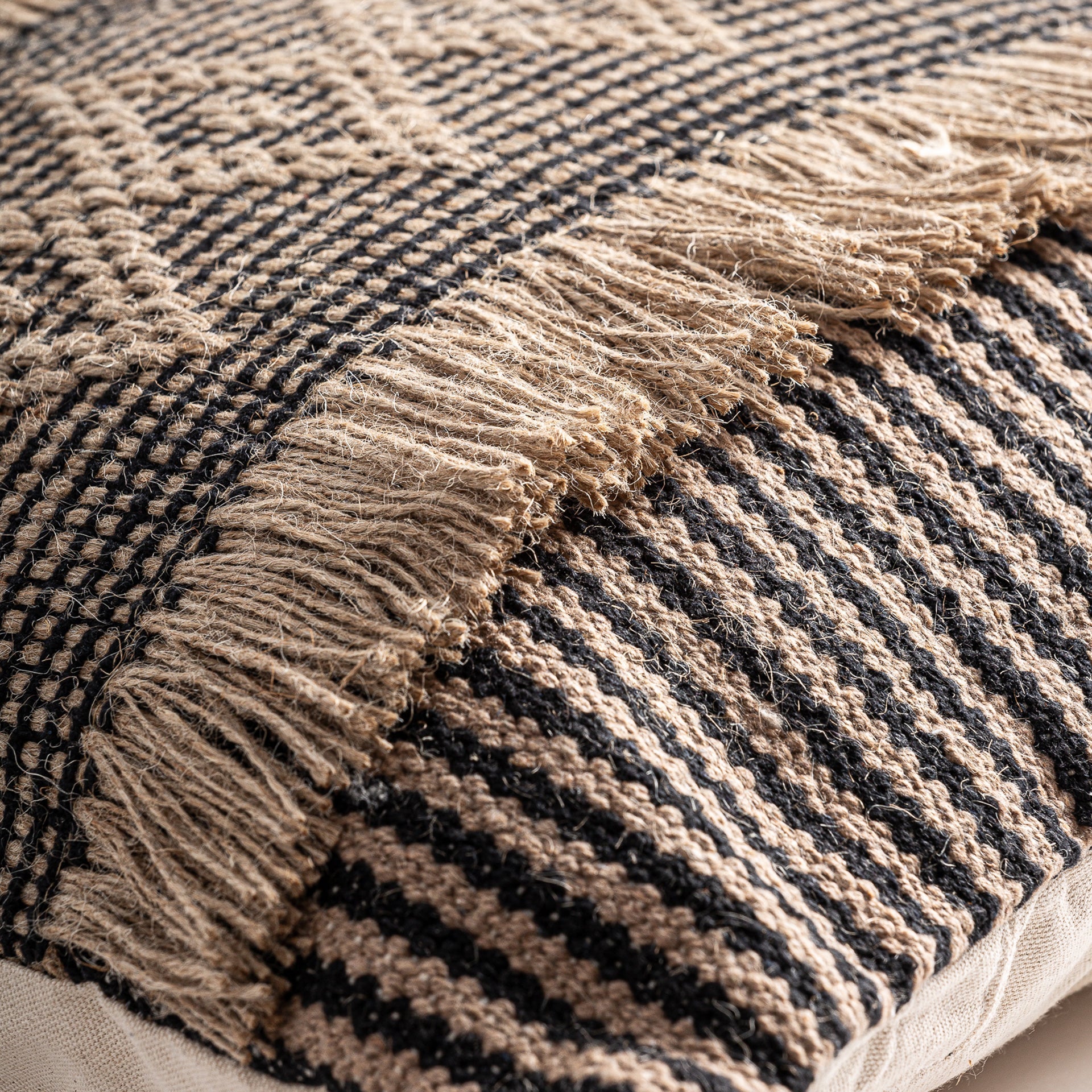 BLAHIR CUSHION in a modern interior setting