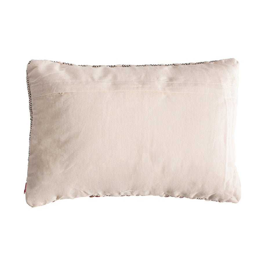 KEALE CUSHION in a modern interior setting