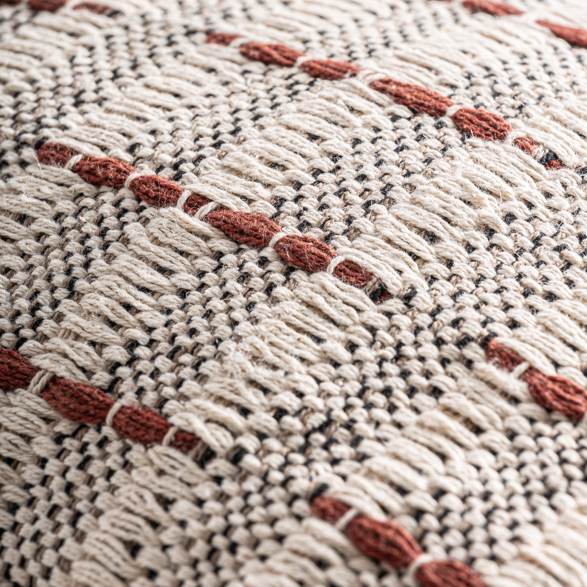 KEALE CUSHION in a modern interior setting