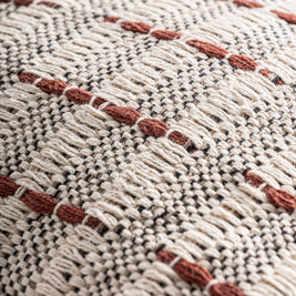 KEALE CUSHION in a modern interior setting
