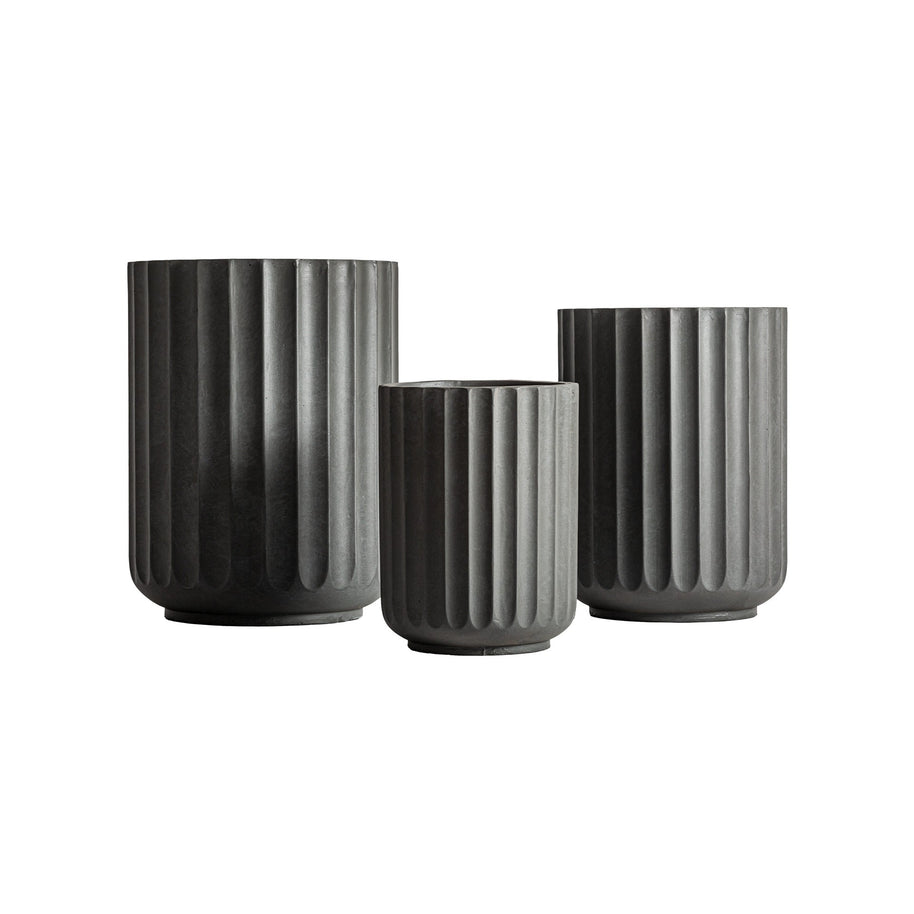 TAVO PLANT POT (SET OF 3) in a modern interior setting