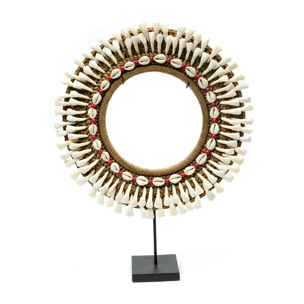 The buffalo-tooth hoop on a stand