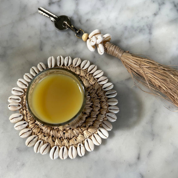 The Raffia Cowrie Shell Keychain