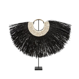 The Alang cowrie on a stand