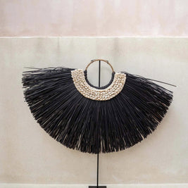 The Alang cowrie on a stand