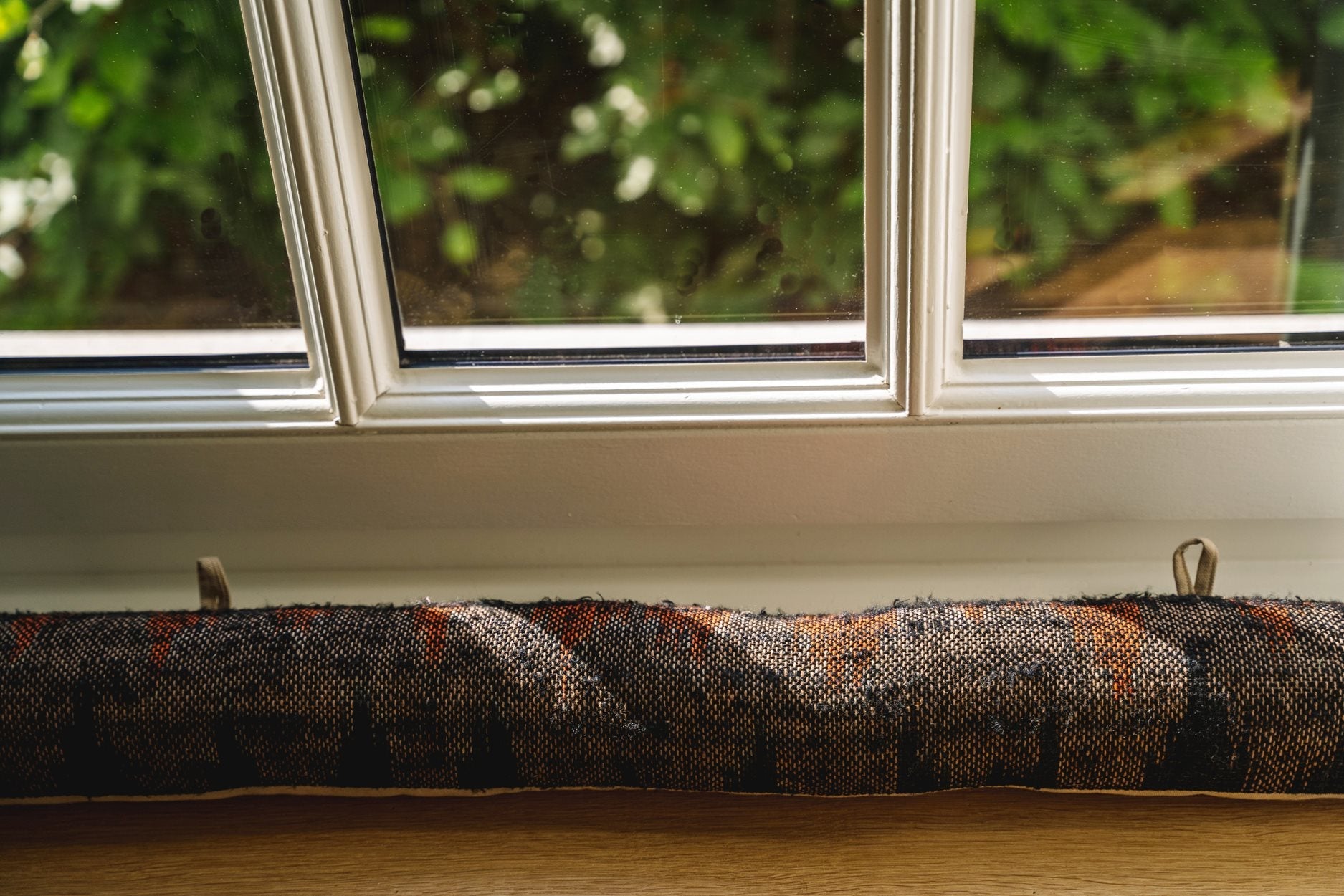 The Oh My Gee Doorstop - Black and Orange