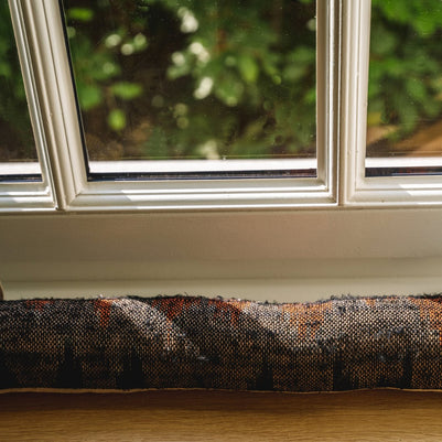 The Oh My Gee Doorstop - Black and Orange