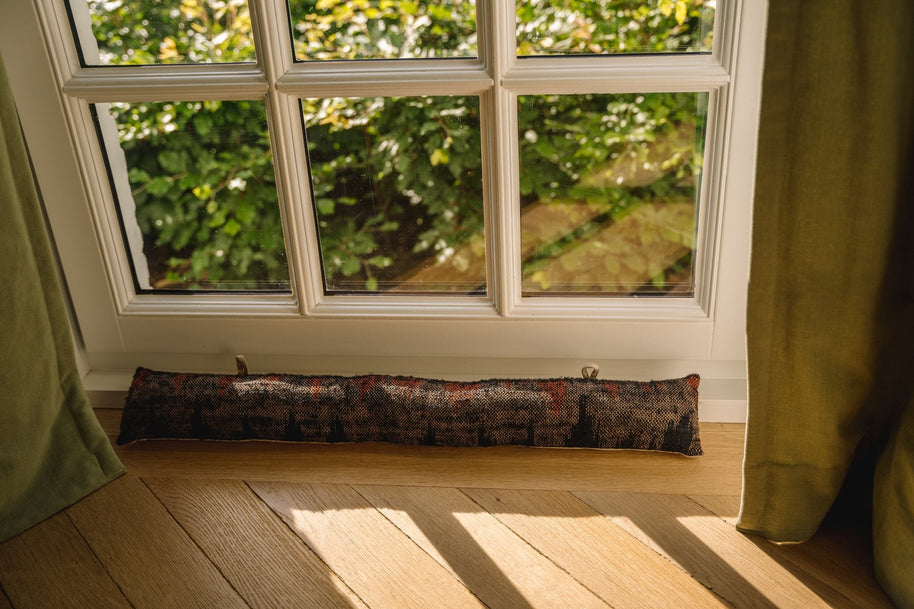 The Oh My Gee Doorstop - Black and Orange