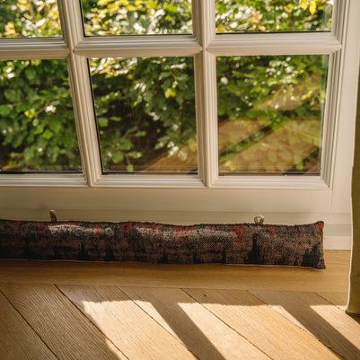 The Oh My Gee Doorstop - Black and Orange